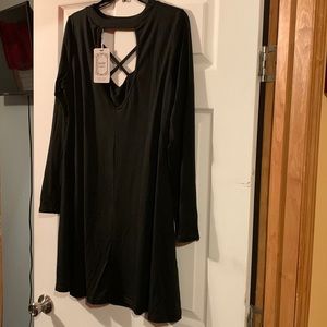 Black long sleeve dress with v cutout in back and cross cross in front